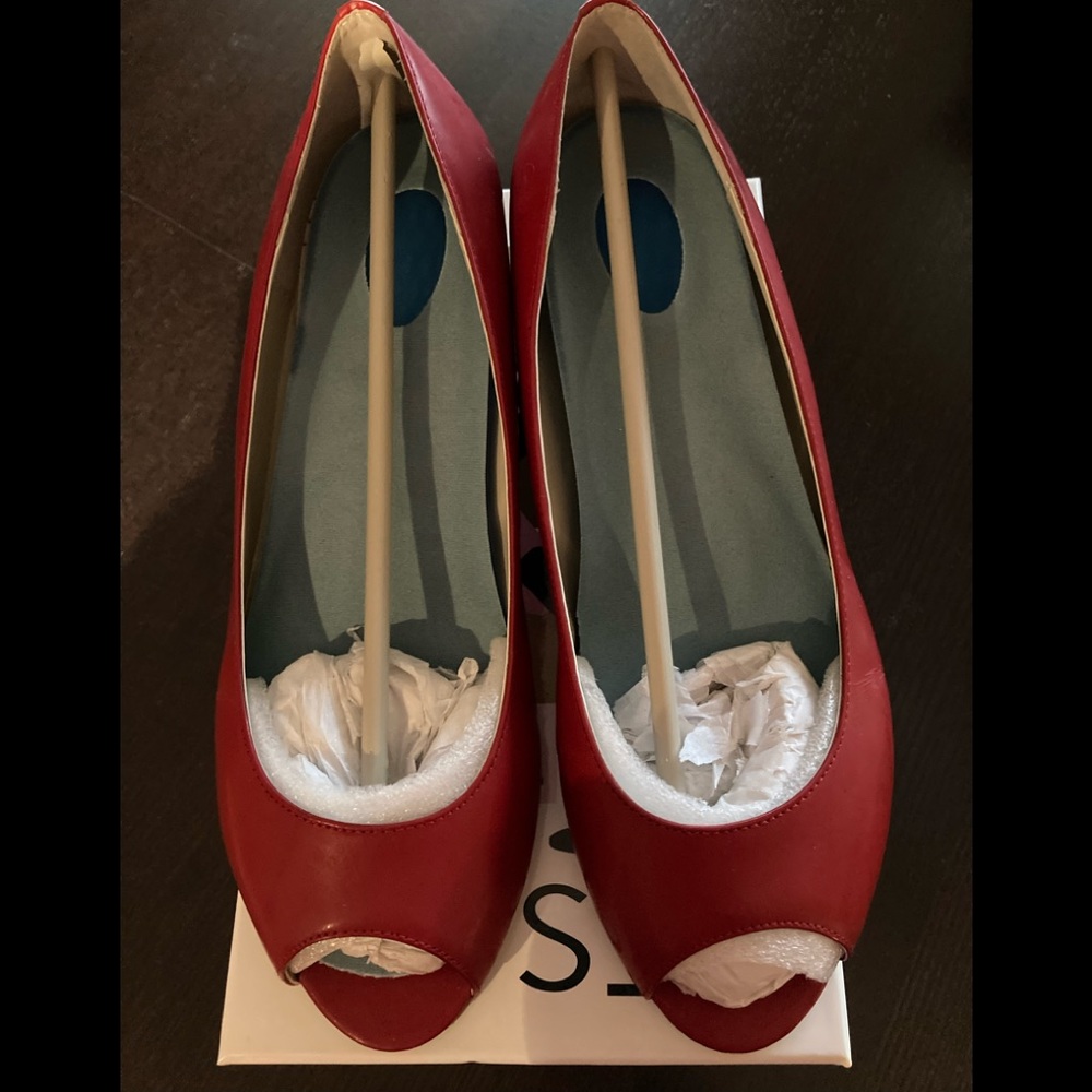 RSVP red peep toe, almost two inch heel.